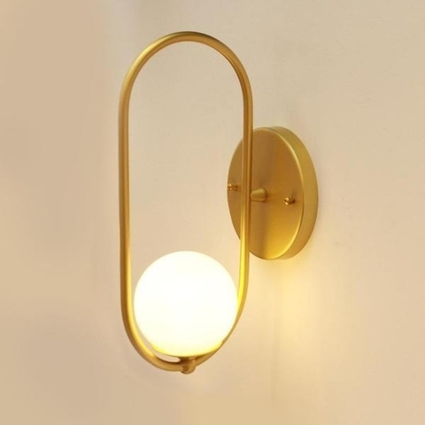 Arandela de Parede Shen dourada com design industrial, ideal para quartos e cabeceira de cama. Lustres Gênesis loja online de Lustres e Iluminação Decorativa