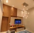 Lustre Pendente Sarvah com 12 globos transparentes em sala de estar moderna Lustres Gênesis loja online de Lustres e Iluminação Decorativa