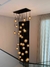 Lustre Pendente Sarvah com 30 globos conhaque espelhados em ambiente com pé direito duplo Lustres Gênesis Site online venda de Lustres e Iluminação