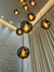Lustre pendente Sarvah com 8 globos âmbar, ideal para escadas e casas com pé direito duplo ou alto. Lustres Gênesis loja online de Lustres e Iluminação Decorativa
