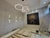 Lustre pendente 4 Rings Alianças Pretas instalado em sala de estar com decoração moderna. Lustres Gênesis Site online venda de Lustres e Iluminação