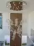 Lustre Plafon de Cristal Gênesis com cristais transparentes, âmbar e azul, instalado em uma casa com pé direito duplo. Lustres Gênesis loja online de Lustres e Iluminação Decorativa