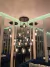 Lustre Pendente Sarvah Moderno com 6 Globos Fumê Espelhado em ambiente sofisticado Lustres Gênesis loja online de Lustres e Iluminação Decorativa