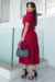 Vestido Longuete,Cor Vermelho Carmin,Tecido Malha Lese, manga Princesa com Cinto Forrado.