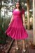 Vestido longo malha lese na cor Pink, com mangas bufantes e cinto forrado.