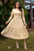 Vestido longo malha lese na cor Dourado, com mangas bufantes e cinto forrado.