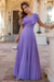 conjunto de blusa e saia longa plissada na cor lilás, com detalhes em malha lurex.