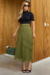 Conjunto de saia longa plissada em tule preto e blusa canelada na cor Verde.
