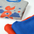 BUZO COMBINADO BIRD CENTRAL GRIS CON ROJO - CACUGUAU - Ropa de bebes y Niños 