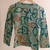 REMERA SHAPES GRIS PERLA NIÑXS en internet