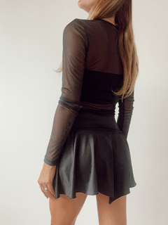 mini asimetrica lycra - $8415 transf - Brunella Online