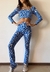 Top TROUBLE floreado AZUL en internet