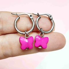 AROS CUBANOS DIJE MARIPOSA FUCSIA ACERO QUIRURGICO