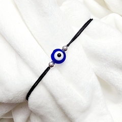 PULSERA HILO CHINO NEGRO OJO AZUL BOLITAS ACERO BLANCO - comprar online