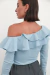 Blusa Volados Asimétrica Bengalina Celeste en internet