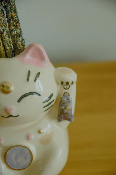 Gatito de la fortuna pescadito en internet