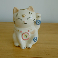 Gatito de la fortuna ojito turco