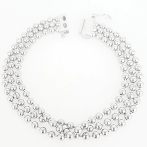 Pulsera triple bolitas plateada