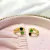 Argollitas Chalu green black (dorado) - comprar online