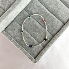 Pulsera bolitas & ojitos multicolor elastizada - plata 925 (cod 24)