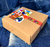 PACK. X 25 CAJA RIGIDA 28X18X5 VENTANA - comprar online
