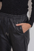 PANT8460 Babucha simil cuero negra con cordon al tono - Indumentaria Wassa