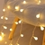 Guirnalda perlas calidas 28 luces ilum - tienda online