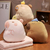 Almohadon capybara calientamanos en internet
