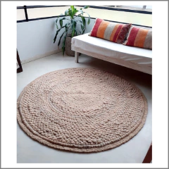 Alfombra circular de vellón y lana tejida en telar color beige - comprar online