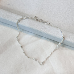 pulsera dos bolitas separadas