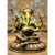 Escultura de Ganesha em metal com detalhes elaborados, mostrando a divindade com várias mãos em uma postura meditativa.