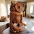 Escultura de Buda Sorridente Feliz na internet