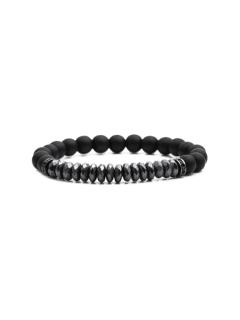 Pulsera elástica con cuentas de hematita negra mate y detalles metálicos en tonos oscuros
