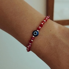 Pulsera cristales rojos con bolitas de plata y ojo turco 17 cm