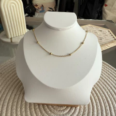Cadena con bolitas acero dorado