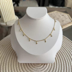 Cadena con etrellitas alrededor enchapado oro 18 k