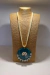 COLLAR CIRCULO CARACOLES