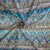 Imagem do Tecido Tule Bordado com Paetê Étnico Turquesa e Dourado