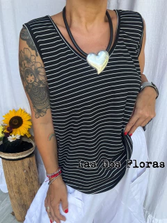 Musculosa ancha evase rayada en internet