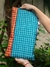 Neceser impermeable - telas recuperadas 18 x 38 cm en internet