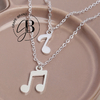 CO 710 - Collar doble notas musicales (AB) - comprar online