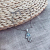 Collar hamsa ojo celeste - Acero quirúrgico K8 - comprar online