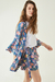 Imagen de SHORT MAGNOLIA FLORES BASE AZUL - TALLE S