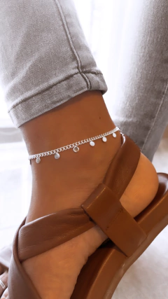 TOBILLERAS ACERO BLANCO CON DIJES FIJOS