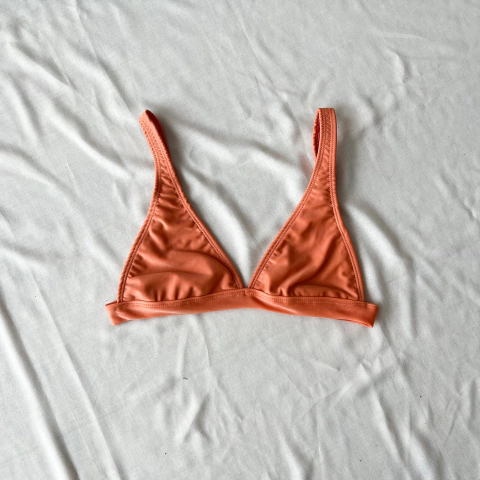 Triangulito fijo durazno