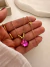Conjunto Bali Cruz Fucsia Acero Dorado