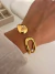 esclava maya drop vacio acero dorado