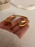 esclava maya drop vacio acero dorado - comprar online
