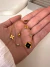 Pulsera Cubik Flor Negro 19 cm Acero Dorado - comprar online