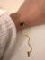 Pulsera Cubik Flor Negro 19 cm Acero Dorado